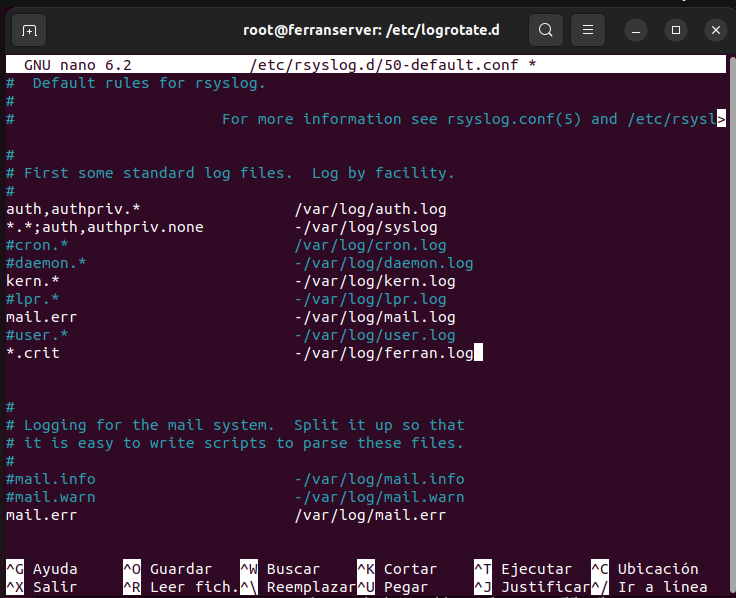 nano 50-default.conf - regla *.crit ferran.log visible